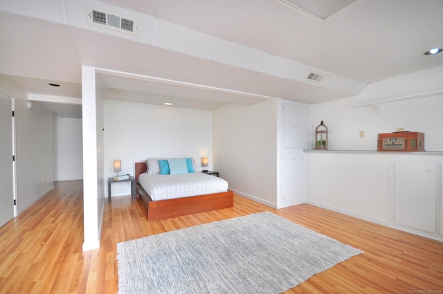 bedroom with light hardwood / wood-style flooring