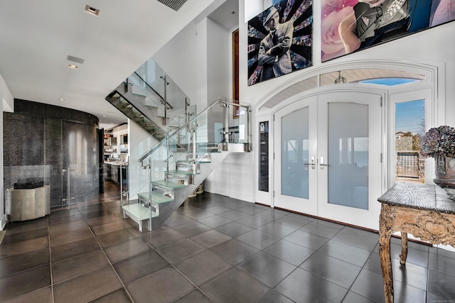 foyer featuring french doors