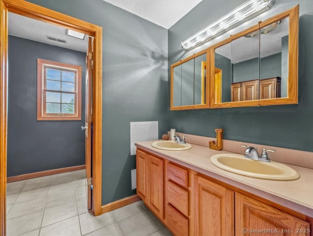 85 Salem Rd, East Haddam, CT 06415 - full bathroom featuring double vanity and tile patterned floors