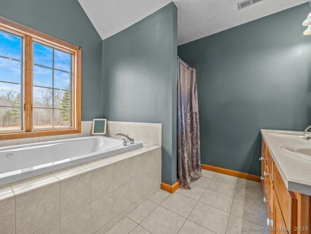 85 Salem Rd, East Haddam, CT 06415 - bathroom featuring a bath, tile patterned flooring, a shower with shower curtain, double vanity, and lofted ceiling