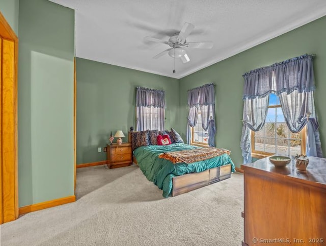 85 Salem Rd, East Haddam, CT 06415 - carpeted bedroom with multiple windows and ceiling fan