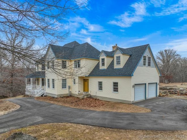 85 Salem Rd, East Haddam, CT 06415 - view of front of home with asphalt driveway, a garage, a chimney, and roof with shingles