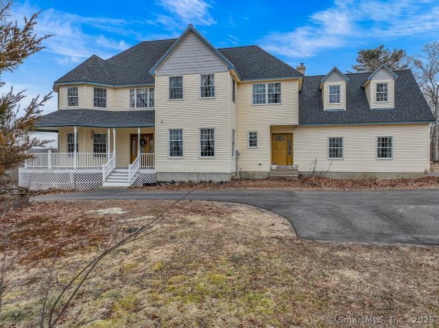 view of front of home featuring covered porch