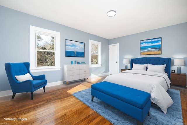 bedroom featuring hardwood / wood-style floors