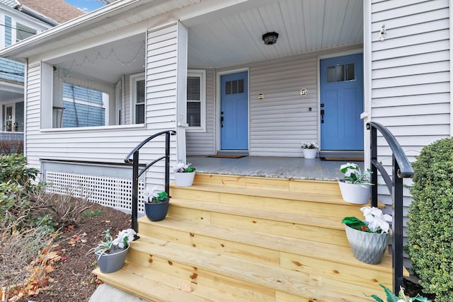 entrance to property with a porch