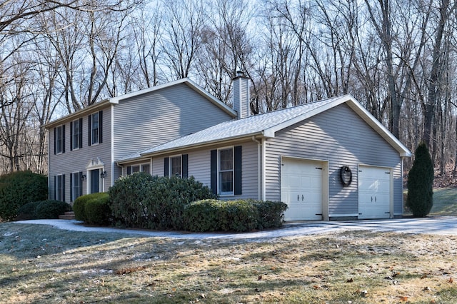 view of home's exterior with a garage