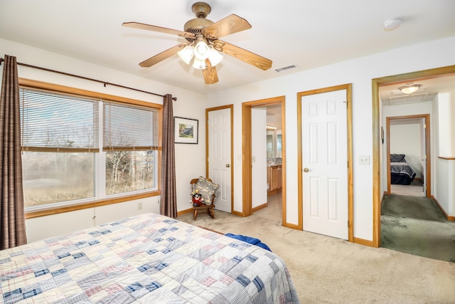 carpeted bedroom featuring ceiling fan