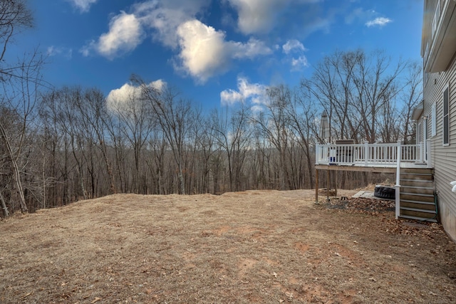 view of yard featuring a deck