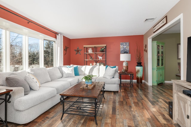 living room featuring dark hardwood / wood-style flooring