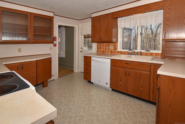 kitchen featuring sink, dishwasher, baseboard heating, ornamental molding, and electric range