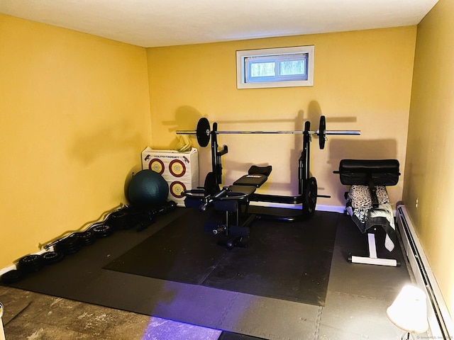 workout area featuring baseboard heating