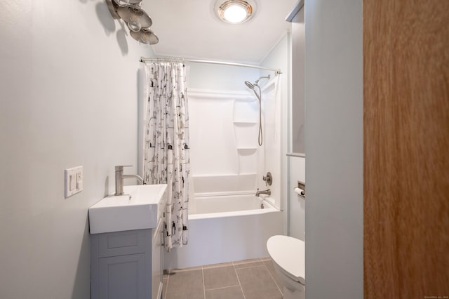 full bathroom with tile patterned floors, vanity, toilet, ceiling fan, and shower / bath combo