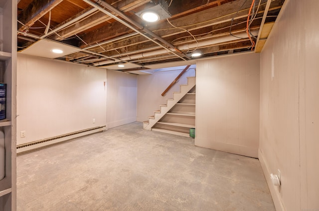 basement featuring baseboard heating