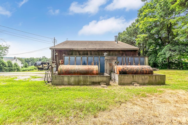 exterior space with a yard