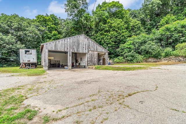 view of outdoor structure with a garage