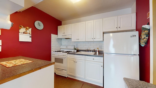 kitchen featuring white cabinetry, sink, tasteful backsplash, and white appliances