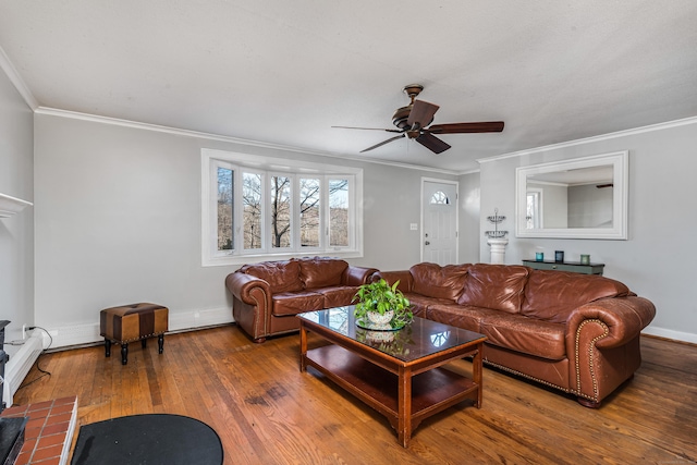 living room with ornamental molding, ceiling fan, and wood-type flooring