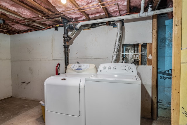 laundry room featuring separate washer and dryer