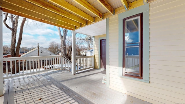 view of snow covered deck