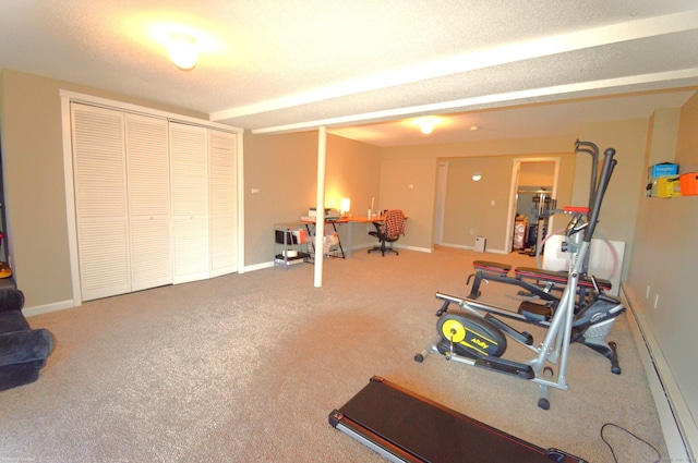 workout area with carpet floors