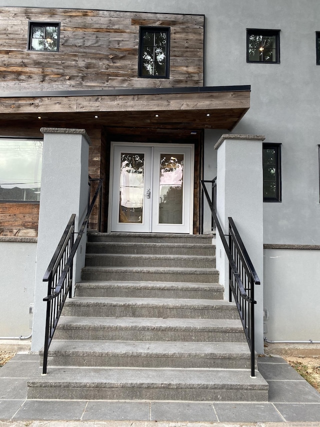 entrance to property featuring french doors