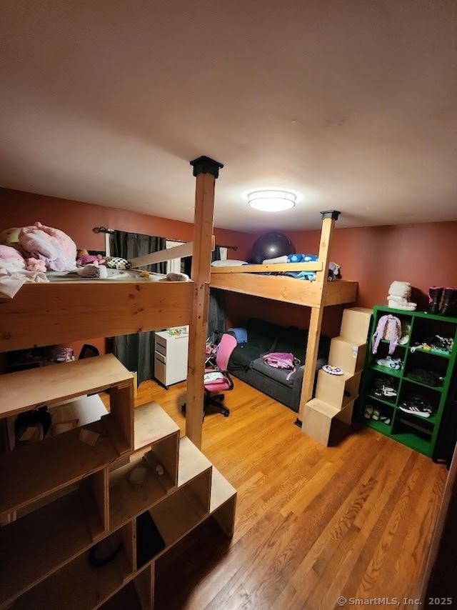 bedroom featuring hardwood / wood-style flooring