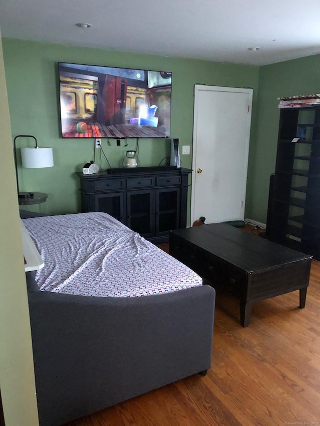 bedroom featuring hardwood / wood-style floors