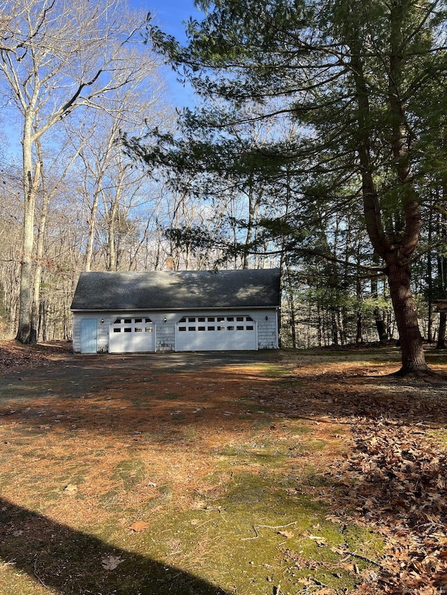 view of outbuilding featuring a garage