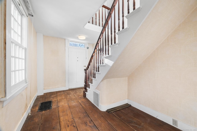 entrance foyer with hardwood / wood-style floors