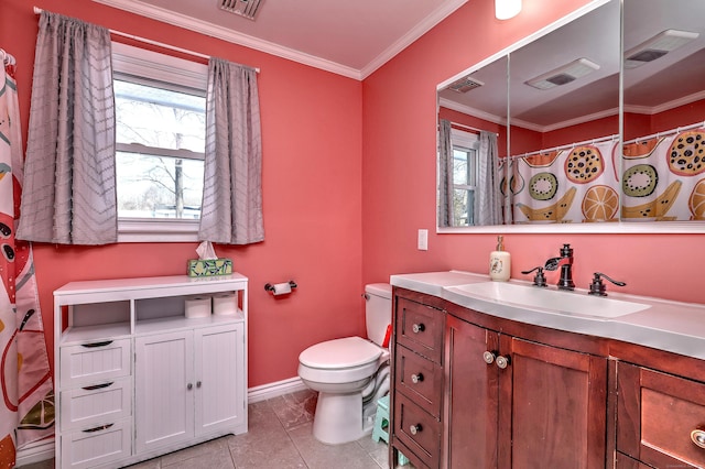 bathroom with tile patterned floors, ornamental molding, toilet, and vanity