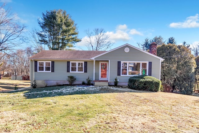 ranch-style house with a front yard