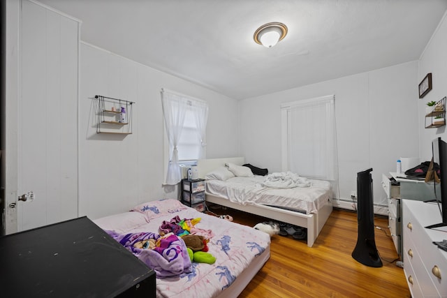 bedroom featuring light wood-type flooring