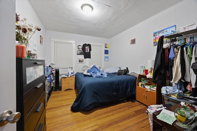 bedroom featuring light wood-type flooring