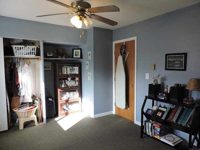 miscellaneous room featuring ceiling fan and carpet flooring