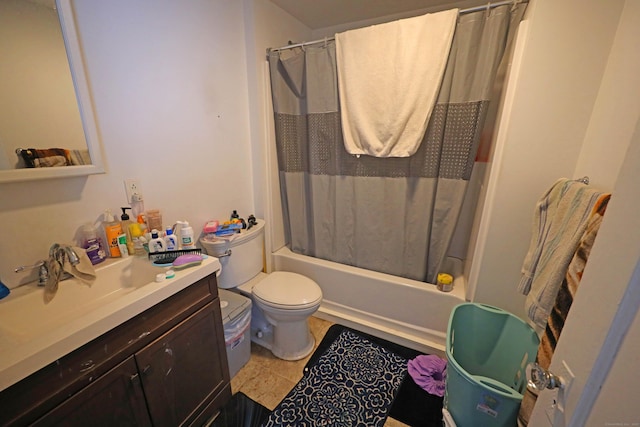 full bathroom featuring toilet, vanity, tile patterned floors, and shower / bathtub combination with curtain