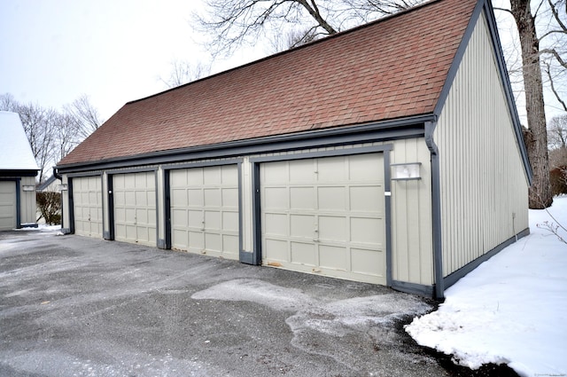 view of snow covered garage