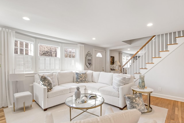 living room with light hardwood / wood-style flooring