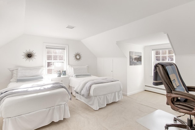 bedroom with vaulted ceiling, light colored carpet, and multiple windows