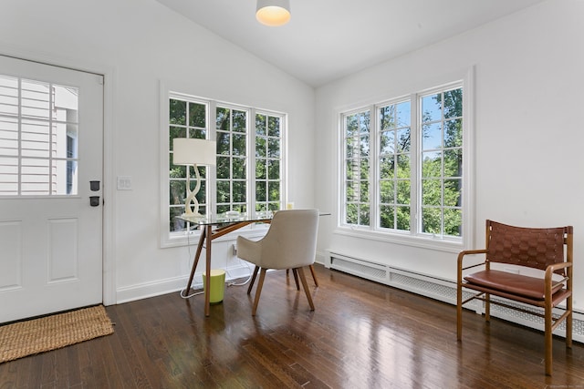 home office with vaulted ceiling, a baseboard radiator, and dark hardwood / wood-style floors