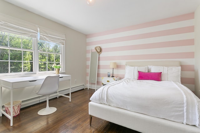 bedroom with a baseboard radiator and dark hardwood / wood-style floors