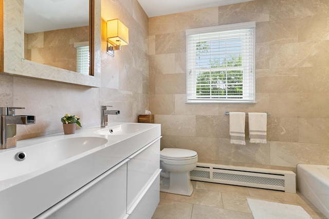 bathroom with toilet, tile walls, tile patterned floors, a baseboard radiator, and vanity