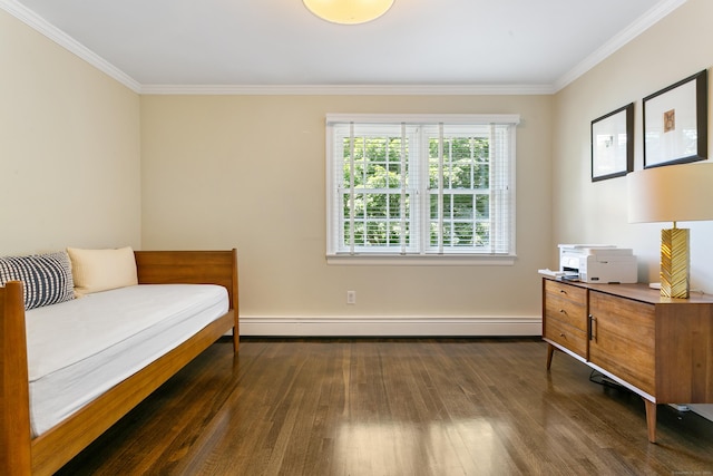 bedroom with crown molding, dark hardwood / wood-style floors, and a baseboard heating unit