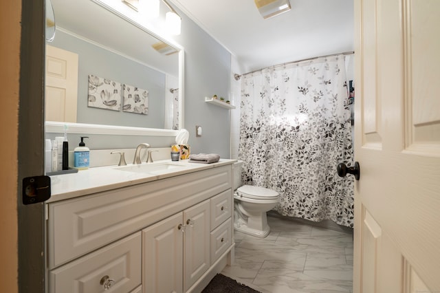 bathroom with vanity, toilet, crown molding, and a shower with shower curtain