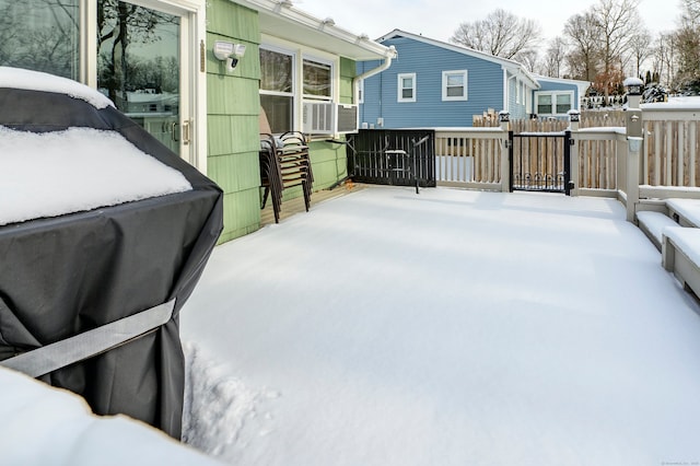 view of snow covered deck