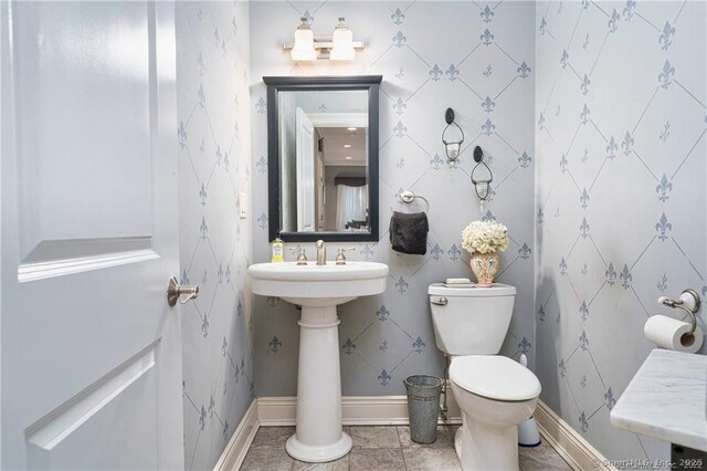 bathroom with sink and toilet