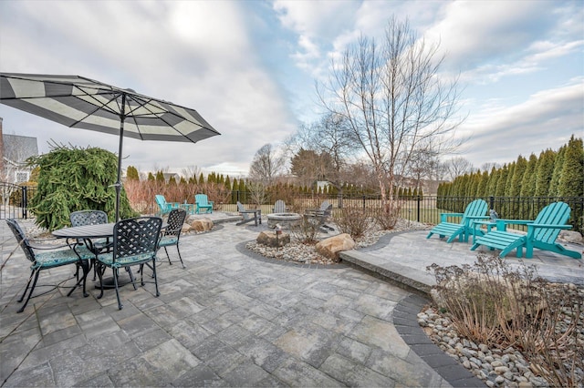 view of patio / terrace with an outdoor fire pit