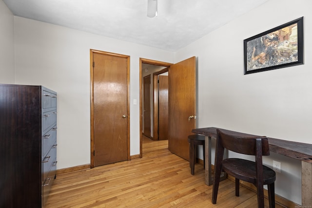 office space with light hardwood / wood-style flooring