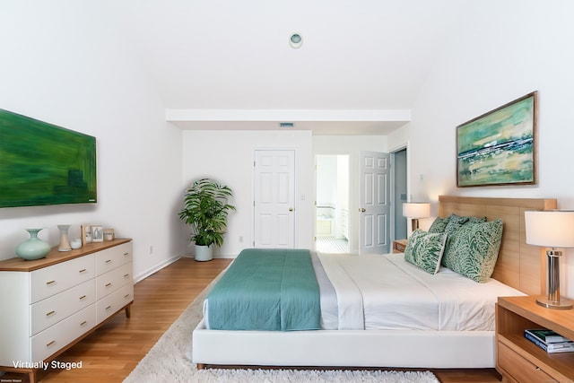 bedroom featuring light hardwood / wood-style floors