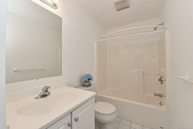 full bathroom with tile patterned flooring, vanity,  shower combination, and toilet