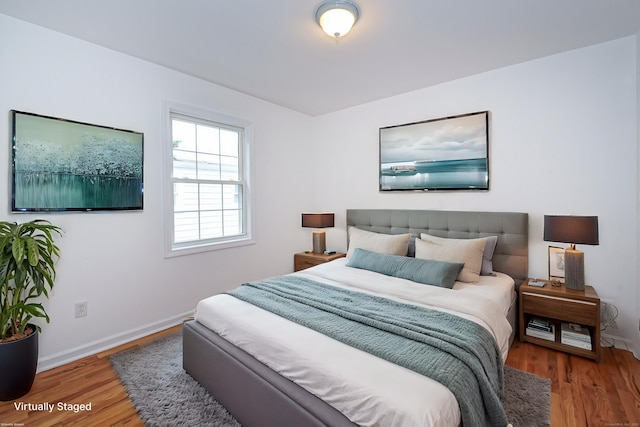 bedroom featuring hardwood / wood-style floors